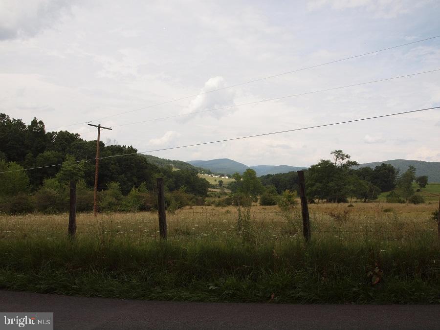 Great location for a new build close to small town amenities. Town water available. Tremendous view down through the valley. some covenants & restrictions. Electric nearby.