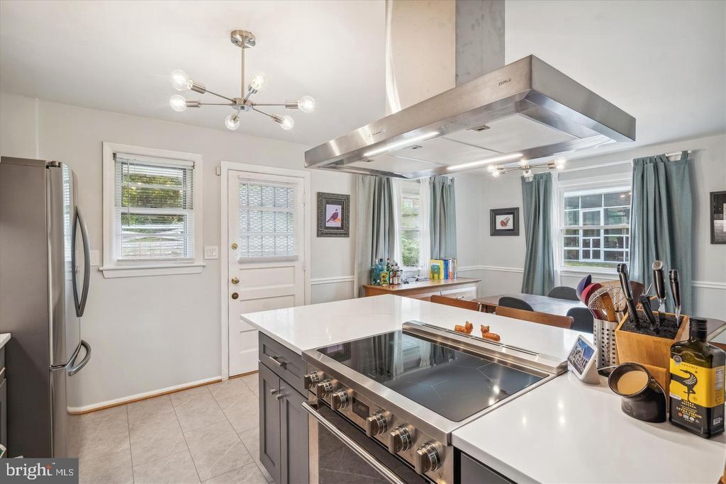 Photo of 5907 85th Ave, NEW CARROLLTON, MD 20784 (MLS # MDPG2177114)