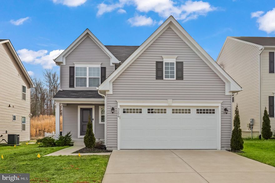 *Sellers are offering a $5,000 credit for grass**  Welcome to this stunning home built in 2020, exuding a fresh and modern feel that makes it seem brand new. The property boasts impeccable curb appeal, inviting you into a residence that truly stands out.

Step inside to discover an open floor plan that enhances the sense of spaciousness and connectivity throughout the home. The contemporary design and layout create a welcoming atmosphere, perfect for both everyday living and entertaining.

The primary bedroom features an ensuite bathroom, offering a private retreat within the home. With thoughtful design and attention to detail, this space provides comfort and convenience.
****Seller will give a credit at settlement to put new sod in the yard****

Venture downstairs to the family room in the basement, offering an additional area for relaxation, recreation, or gatherings. The versatile layout of this home ensures that there is room for everyone.

The large yard presents a canvas for your creativity, waiting for your personal finishing touches. Whether you envision a vibrant garden, a serene outdoor oasis, or a play area for children, the possibilities are endless. The two-car garage provides convenient parking and additional storage space.

Beyond the property, the community offers a range of amenities, including a pool, parks, trails, and a community center. Embrace a lifestyle that combines the comfort of home with the benefits of a vibrant and welcoming community.

Don't miss the opportunity to make this meticulously maintained and thoughtfully designed home yours. Schedule a showing today to experience the perfect blend of modern living and community amenities.