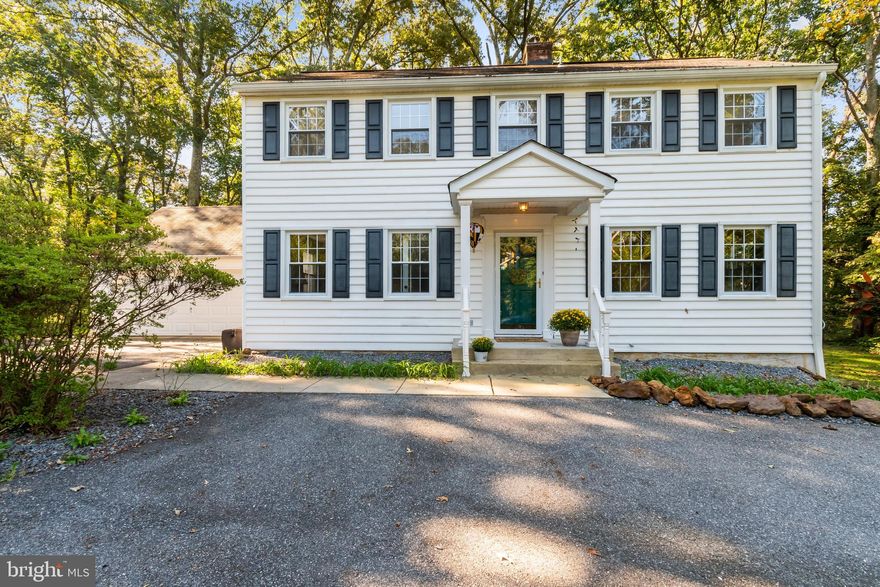 Large price reduction! Owner has found his future home and ready for an offer. Large classic colonial in Fairwinds on the Severn with water access amenities. Refinished hardwood floors and freshly painted, giving you a clean, fresh, start moving into your new home. Conveniently located at the traffic light, to make entrance to Benfield Road very easy and cross walk and sidewalks with safe walking access to Benfield Elementary School, Safeway, Bank and Restaurants. Beautiful center entry colonial featuring a large, sunny, family room addition in the back of the house with 5 bedrooms, 3 full baths and one half bath. Large cozy living room with fireplace.  Sunny library with built in shelves and wainscot trim. Spacious eat-in kitchen with island,  granite counters, lots of storage and desk. Bonus, generous size family room addition with vaulted ceiling and sliders onto paver rear yard patio. Finished basement offers tons of additional living space, possible 5th bedroom/office, laundry room, wet bar and full bath.  Two car garage, circular drive with lots of convenient parking. Paver walkway around house to back patio. Don't miss your opportunity to see this Fairwinds on the Severn home.