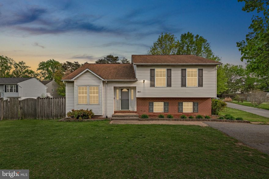 This spacious split-level home offers a fantastic layout, a huge backyard, and tons of potential! The main level features a welcoming foyer and large living room with vaulted ceilings, a built-in propane fireplace and laminate wood flooring. Upstairs you will find the kitchen with a breakfast bar, plenty of cabinet space, & a pantry, a separate dining room with a slider leading out to the deck, as well as 3 bedrooms and 2 full bathrooms including the primary suite with an updated private ensuite! The fully finished walkout lower level is home to an enormous family room, the 4th bedroom, which can serve as a workout room/office/playroom/guest room/etc., a full bathroom, a laundry/storage room with tons of space, and a crawl space you can access through the 4th bedroom closet that extends the entire length/width of the living room! Step outside to the fully fenced backyard, with plenty of room for barbecues, a garden, or even a future pool! Whether you're hosting a summer party or enjoying a quiet evening under the stars, this yard has it all. Plus, NO HOA! Sold strictly AS IS this home needs some cosmetic updates and repairs but offers solid bones and is ready for your personal touch! Roof (2018) HWH (2024)