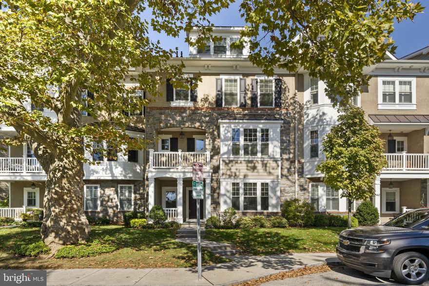 Welcome to 144 Pennsylvania Avenue, a beautifully designed townhouse combining elegance and functionality, just one block from Bryn Mawr's vibrant center. A cobblestone walkway leads to a covered front porch and into the garden-level foyer. The main level features an office/den/workout room, convenient two-car garage access, and beautiful hardwood floors that flow seamlessly throughout. An elevator conveniently services all four levels, ensuring ease of access throughout.

 The second level boasts a spacious, open-concept kitchen adorned with white cabinetry, crown moldings, granite countertops, and a large granite island. Equipped with Bosch stainless steel appliances, including a five-burner gas cooktop, wall oven, and built-in microwave, this kitchen is perfect for the avid chef. Additional highlights include an appliance storage area, a pantry, and a half bathroom. The kitchen opens to a generous living and dining area, complete with recessed lighting, a gas fireplace, and built-in shelving. Step outside to the charming patio and enjoy alfresco dining.

The third level offers a luxurious primary suite with a massive walk-in closet and a beautifully appointed en-suite bathroom featuring crown molding, double sinks, an oversized shower, a separate toilet room, and a Jacuzzi tub. This level also includes a second bedroom with a full bathroom and a large closet, along with a laundry room equipped with a utility sink and additional storage.

Continuing upward, the fourth level features a spacious bedroom and a full bathroom with a stall shower. Ample storage options include a walk-in closet, a second closet, and a finished oversized attic storage area.

Located within walking distance of Bryn Mawr Village, residents can enjoy easy access to a variety of amenities including, fine dining restaurants, boutique shops, grocery stores, the R-5 train, Bryn Mawr Hospital, Starbucks, a open air weekly farmers market, Bryn Mawr Film Institute, parks, and convenient access to public transportation. A perfect blend of suburban tranquility and urban convenience awaits.