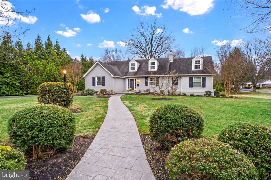 One-of-a-kind gem in Westover Hills is a must see!  This is your chance to get into the neighborhood that everyone dreams about. It is the quintessential Norman Rockwell setting with timeless brick and stone homes, tree-lined streets and open space.  This "just right" sized classic cape cod has been expanded and updated for easy living in a fantastic location! Situated on a beautiful .63 acre lot, the owners had a gorgeous main floor primary suite addition professionally completed in 2014.  The craftsmanship, moldings and details are breathtaking!  Beautiful ceiling detail with custom trim, indirect lighted soffit, chandelier and huge walk-in closet.  The luxury bath was designed after a spa bath at the Four Seasons in Hawaii!  A second main floor bedroom and full bath provide the option for multi-generational living.  This room could also be an office with a wall of built-ins.  2 additional bedrooms and a bath complete the second floor.  The professionally finished basement includes a 5th bedroom with egress, large recreation room, spacious laundry and additional powder room.  The wall was removed between the kitchen and dining room to create an open concept with beautiful cabinetry, custom backsplash and granite counters. A mud room side entry doubles as a huge pantry - super convenient right off of the garage. The turned 2 car garage is spacious with built in cabinets and epoxy floor.  The rear composite deck looks majestically out over the flagstone patio and gorgeous lot with stream.  Gorgeous huge custom shed matches the house and offers so much extra storage space for all of your gardening and outdoor items.  A whole house generator -YES!  All of the bathrooms have been stylishly updated and you will find ample closets and built-ins galore throughout the house.  There is SO much to love - move right in!!!!