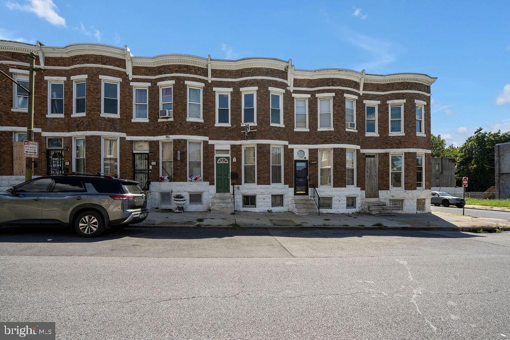 Welcome home to 1807 Riggs Ave. This recently renovated row home is located in Sandtown-Windchester -one of Baltimore's oldest neighborhoods! The home features over 1,500 square feet of living space. As you enter the home, you'll be greeted by a charming living room boasting high ceilings, and plenty of natural light. The living room flows seamlessly into a separate, spacious dining area, perfect for entertaining guests or enjoying family meals, The updated kitchen features modern appliances, ample storage space, and beautiful granite countertops that make cooking and meal preparation a breeze. The second floor features three generously sized bedrooms, each with plenty of closet space with more natural light pouring in. The full bathroom with a shower/tub combo awaits you down the hall. Washer and dryer tucked away in the basement, where you'll also have plenty of space for storage. Located just minutes away from downtown, local restaurants, shopping, and entertainment options, this property is perfect for those looking to enjoy all that Baltimore has to offer. Don't miss out on the opportunity to make this cozy, charming townhouse your new home. Schedule a tour today! - NO pets! Tenant responsible for ALL utilities. All square footage is estimated.
