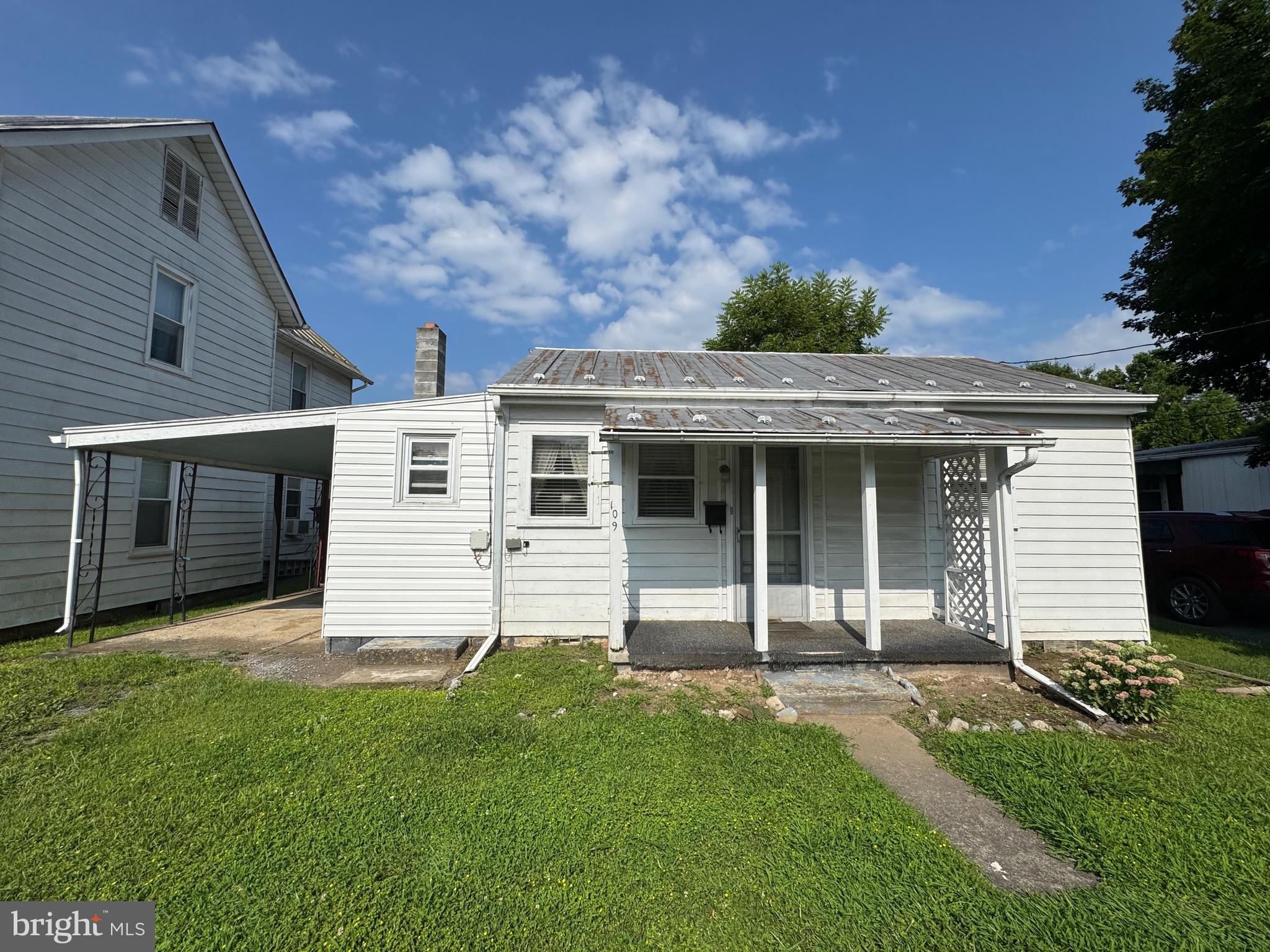 This property is conveniently located in the heart of Moorefield. With two houses this would be the perfect place for a multi-generational family. While this property needs some renovations, it offers incredible protentional to create a personalized family haven. The mature landscape makes the back yard feel like your own personal hide away. A great way to unwind and enjoy the time with your family after a long day at work.