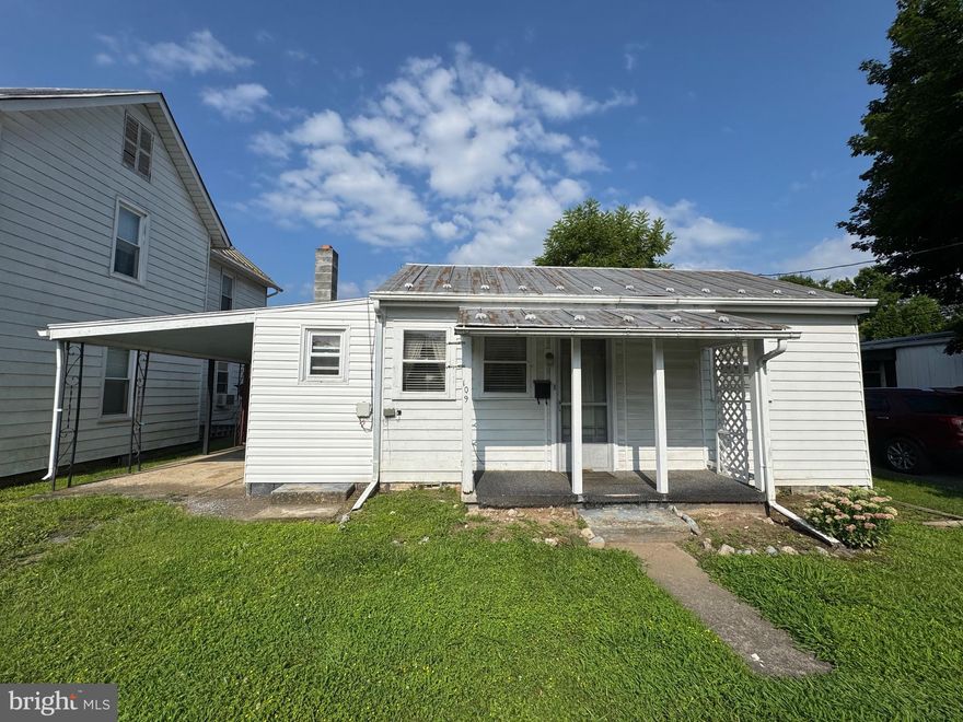 This property is conveniently located in the heart of Moorefield. With two houses this would be the perfect place for a multi-generational family. While this property needs some renovations, it offers incredible protentional to create a personalized family haven. The mature landscape makes the back yard feel like your own personal hide away.  A great way to unwind and enjoy the time with your family after a long day at work.