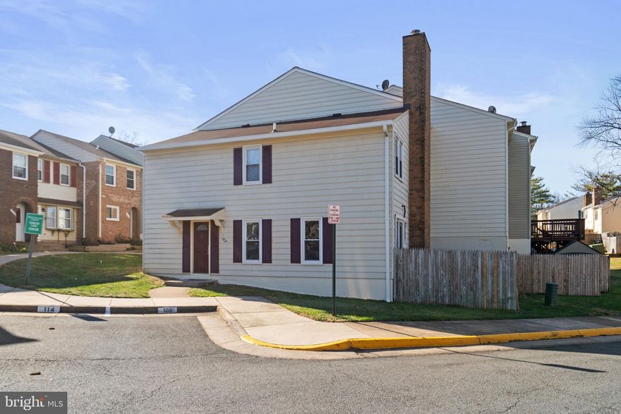 FULLY Top to bottom remodeled END UNIT, 2 level townhouse for sale with 2 bedrooms, 1 bath with fenced backyard! Enter to find vinyl floors on the main level - with dining and living room with wood burning fireplace, along with a cozy kitchen with corian countertops and white appliances including built-in microwave. The backyard is fenced with a small patio. Ascend the stairs to find 2 bedrooms and 1 full bath. One of the bedrooms has attic access for storage. Convenient stacked washer/dryer