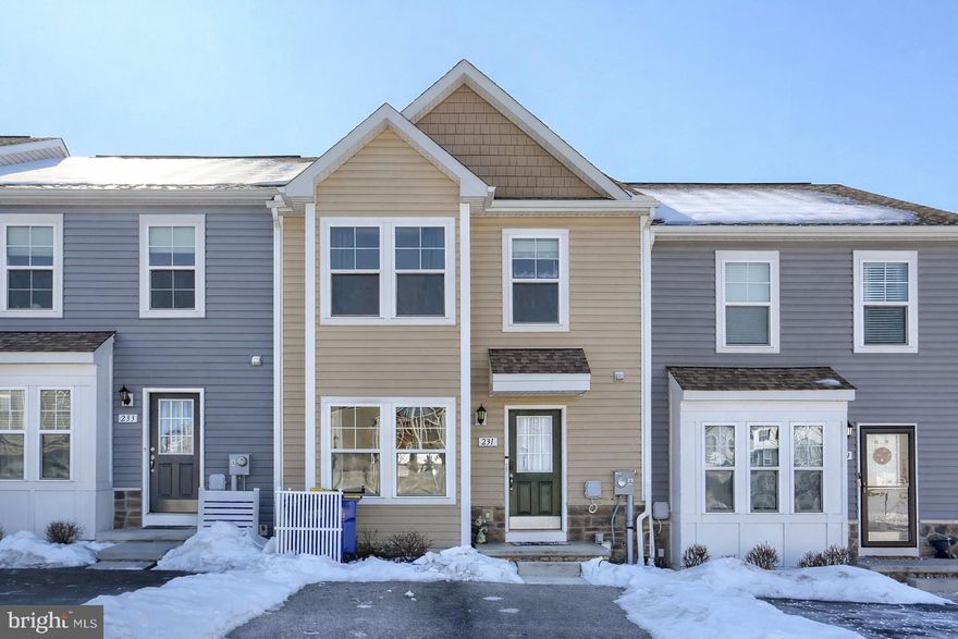 Welcome to 231 Homestead Dr, a stunning modern townhome in Hanover, PA — perfectly designed for today’s lifestyle. This well-appointed residence offers 3 bedrooms and 2.5 baths with nearly 2,000 sq. ft. of thoughtfully finished living space.

Step inside to discover an inviting open layout that seamlessly connects the living and dining spaces, making everyday living and entertaining effortless. At the heart of the home is the beautifully designed kitchen — featuring ample cabinetry, sleek quartz countertops, a generous center island with room for seating, and premium stainless-steel appliances. This gourmet space provides both style and functionality, with plenty of prep and storage space that flows perfectly into the adjoining living area — ideal for gatherings or casual meals.

Upstairs, the serene primary suite offers a relaxing retreat with an en-suite bath and generous closet space, while two additional well-sized bedrooms share a full bathroom and convenient laundry area.

The finished basement adds valuable extra living space — perfect for a home theater, playroom, gym, or office — and includes additional storage options to keep everything organized.

Located in a desirable community near parks, shopping, and dining, 231 Homestead Dr combines thoughtful design, quality finishes, and practical comfort. This home presents a rare opportunity to enjoy modern living in a move-in ready package.