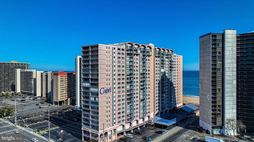 Introducing a stunning 3-bedroom, 2-bathroom direct oceanfront condo at Capri that has undergone beautiful upgrades: new lighting, paint, & flooring. Beautiful ocean views await you from the private balcony. The balcony itself is the perfect spot to unwind after a long day at the beach.The three spacious bedrooms feature beautiful window shutters. This exceptional property caters to your every need and desire, providing the perfect balance of coastal living and opulent comfort with its prime oceanfront location and fantastic amenities like: a pool, basketball courts, fitness center, game room, library, meeting room, sauna, on-site security, and tennis courts. Embrace the oceanfront delight that awaits within these walls and experience a life where luxury meets the boundless beauty of the ocean. Rental potential is around $35k-$45k. Rented with Vacasa. 2024 Rentals to be honored.