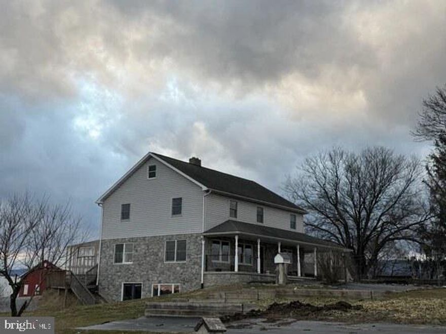 ABSOLUTE REAL ESTATE AUCTION, Thurs March 12th 2026 @ 5:00 P.M.
15+ Acres w/ Two story home. Approx. 2,896 sq. ft. of living space; kitchen. Open concept Living room, main floor Master bedroom w/ full bath, & attached nursery, mud room/laundry room; Attached Greenhouse area off of main floor; 4- bedrooms, 1 full bath on 2nd level; Full Attic area, full basement w/ ground level walk out entrance; Woodstove heat, home is set up for outdoor furnace, forced hot water heat; wrap around porch, front yard w/ mature trees, horse shoe drive, garden area; Round roof barn w/ horse stalls & hay loft w/ attached pasture area; Kennel w/ outdoor run, Kennel is wired w/ receptacles & set up for forced hot water heat; Attached Machinery shed, 50’x100’ barn built new in 2018, set up with tack room & wash bay area, currently used for cattle, was originally set up  w/ 12 horse stalls, w/ exterior doors; Greenhouse pad plumbed for heat from an outdoor woodstove; Acreage is mostly fenced w/ pasture & tillable acres; A lot of possibilities w/ this property & plenty of room to expand; Great views; A nice Country property within walking distance to State Game Lands 169 w/ approx. 2,514 acres; Property sells as Absolute to Highest Bidder, Owners are Relocating, Come prepared to buy...