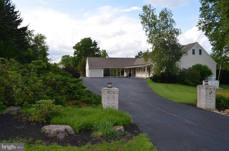 Enjoy the lifestyle of Lake & one floor living on 1 acre with hardscaping & gardens  Semi open floor plan w/plenty of sliders leading to your trex deck Beautiful Cherry wood kitchen w/corian counter tops Hard wood floors  sun room laundry 2 Owner's suite's both w/en suites, 1 w/FP Great room w/gas FP Whole house generator Pull through 2 car port private gate shed