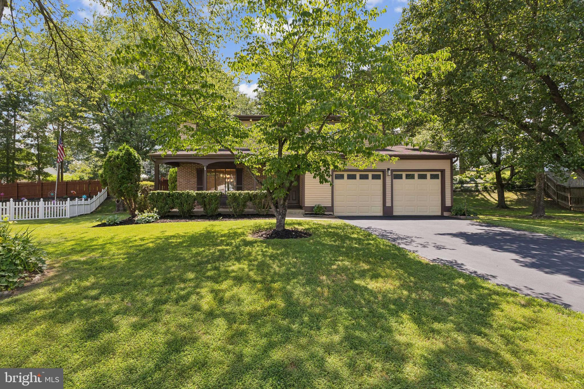 Welcome to this beautifully renovated single-family home nestled on a quiet cul-de-sac in one of Woodbridge’s most desirable communities! This home has been thoughtfully updated with modern finishes throughout, including brand-new flooring and carpeting, a fully remodeled kitchen and bathrooms, fresh paint, new lighting fixtures, and more. The HVAC and hot water heater were updated in 2017, offering added peace of mind. As you step inside, you're welcomed by elegant plank flooring that flows seamlessly through the main living areas. The main level features a spacious living room, a separate dining area, a cozy family room, and a stunning kitchen outfitted with custom cabinetry, quartz countertops, a stylish backsplash, and stainless steel appliances. Upstairs, you'll find four generously sized bedrooms and two full bathrooms, including a serene primary suite. The main level bathroom has been tastefully renovated with porcelain tile and a modern vanity. The fully finished lower level includes a large den with an upgraded full bathroom, additional storage space, and a dedicated laundry area with a brand-new washer and dryer. Step outside to enjoy the expansive covered deck—freshly painted and perfect for relaxing or entertaining guests. Ideally located just minutes from major highways, Potomac Mills Mall, and a variety of dining and shopping options, this home offers both comfort and convenience. Don’t miss your chance—this one won’t last!