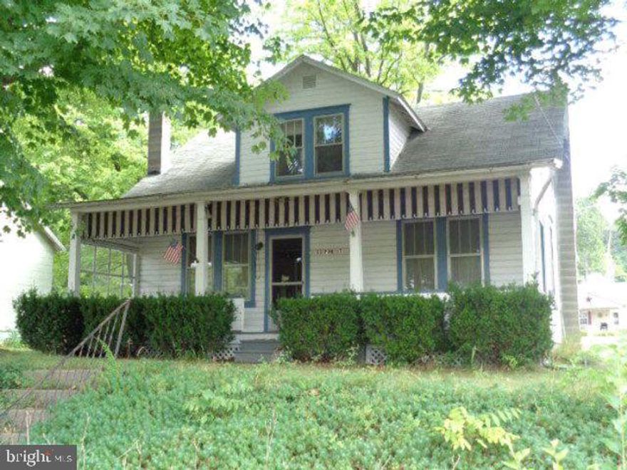 Quiet and peaceful with garage & carport. 2 sheds. Covered pavilion with beautiful stone fireplace for grilling.