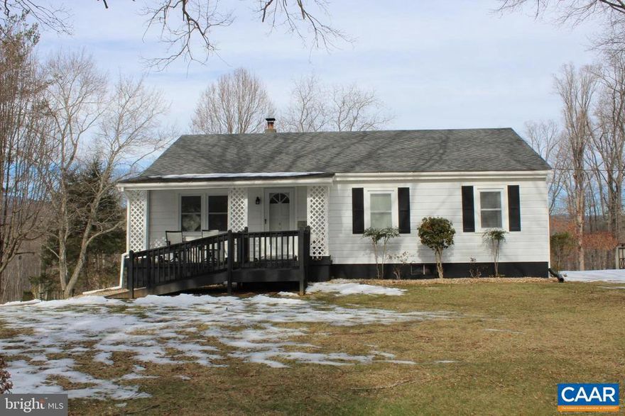 Charming, cozy home on 2.180 AC with mountain views. Hardwood floors, unfinished basement for expansion or storage. Outside features a covered front porch, concrete walk way handicap accessible, back deck, large storage shed and lovely large yard for garden spot.
