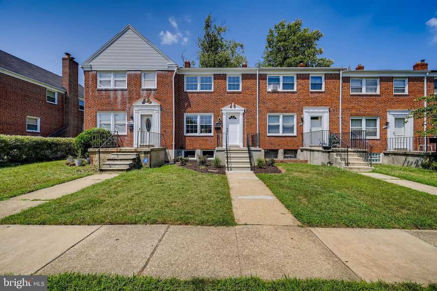 This renovated townhome in Edmondson Heights will grab your attention at first sight! Curb appeal abounds with new landscaping and an adorable front porch. Inside, this 3 bedroom, 1.5 bathroom townhome boasts updates throughout, including a new roof, deck and patio, upgraded hot water heater, new gleaming hardwood floors, upgraded lights, fixtures, and more! The new kitchen features quartz countertops, stainless steel appliances, new cabinets, a custom backsplash, and a breakfast bar. The spacious living room features built-in shelves and plenty of gorgeous natural light. Upstairs, the full bath is all new, with tile floors and a shower/tub combo. On the lower level, you'll find new carpet, a washer and dryer, large laundry room, and a half bath.