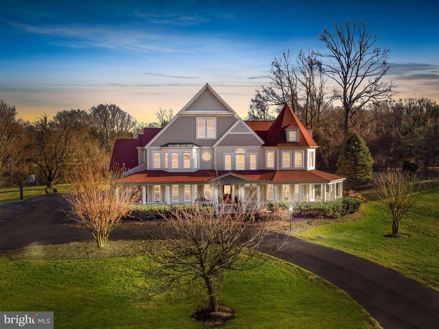 Welcome to this gorgeous custom Craftsman Victorian on over 4 acres of gorgeous grounds with amazing outdoor space including a heated pool, patios, gazebo, retractable awning and so much more! This custom home has over 5,300 square feet of living space plus the basement and the third level/finished attic making the home over 7,000 square feet of gorgeous!!  Walking through the front door you are welcomed by the grand two-story foyer and gleaming hardwood floors. A private office/library is tucked away just off the foyer and features custom wood-built ins complete with a large desk for all your work from home or studying needs. The designer kitchen includes two large islands, one for cooking and prep work, and the other with seating for four. Double ovens, open plate rack and shelves, glass front cabinets, beverage refrigerator, high end gas range, freshly painted cabinets (2022) and brand new backsplash (2022) complete the kitchen area. Just off the kitchen you will find multiple entertaining spaces including the family room with gas fireplace, sunroom overlooking the back yard, breakfast room with vaulted ceilings, and a bonus room currently being used as a billiards room. Just off the kitchen is the mudroom with large closet, built in cubbies with bench seating, additional door leading to the backyard, garage access, and a back extra-wide staircase leading up to the bedroom level. On the upper level, you will find 5 beautifully spacious bedrooms, and three full bathrooms. The front bedroom features the unique curved turret design with cathedral ceilings, loads of windows, and so much charm. The primary suite is the oasis you have been looking for. Vaulted ceilings, a gas fireplace, expansive en-suite, and even a small Juliette balcony overlooking the back yard. The primary bath features a double walk-in shower with body sprays, 2 sink areas, 2 closets, and a whirlpool tub. Don't miss the walk-in closet with built-ins, shoe closet, and wainscotting. Up another level you will find the sixth bedroom/bonus room. The basement is an entertainers dream and features crown molding, 2 built-in drink refrigerators with cabinets and counter space, custom wall paneling, exercise area with padded flooring, full bath, storage area with built in floor to ceiling shelves, entertainment area with built in shelves, half wall wainscotting, and a custom wine rack storage area (can hold 60 bottles). Numerous additional stand out features that you don't want to miss include:  nine-foot ceilings throughout, retractable awning on part of the patio, recently installed in 2020; crown molding on most of the first floor and custom molding in the family room,  recessed lights in family room, kitchen, pool table room, computer room, basement and two story foyer, hardwood floors throughout most of the home, mudroom off garage with four built-in cubbies and bench seating, and a huge pantry with built in shelves.  Multi-level large stone patio with built-in stone firepit leading to pool which features a waterfall and gazebo.  (Pool resurfaced in 2020). Pool heater and pump/filter new in 2022. There are ceiling fans in every bedroom, sunroom and family room. Home is equipped with a CSI water treatment system. There is a separate computer room with built-in desk and shelves just off the kitchen.  Second floor laundry just outside the primary bedroom complete with closet and cabinets. New roof was put on the entire house in 2019. The yard is partially fenced with 5 ft - aluminum fencing. New windows in front of the house installed in 2019. New smoke detectors and carbon monoxide detectors installed in December of 2022.