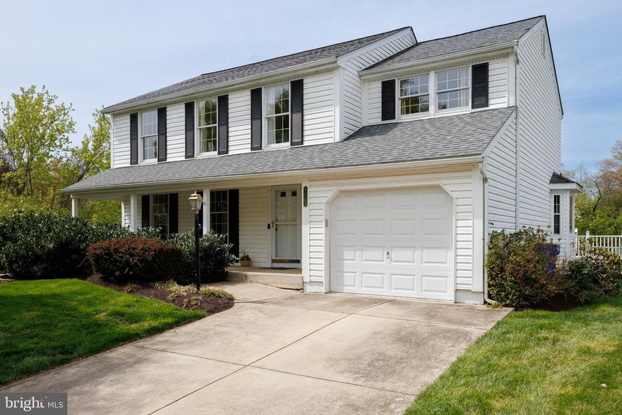 Impeccably maintained and thoughtfully updated, this stunning home in the desirable Sewell’s Orchard community offers 4 bedrooms and 2.5 baths across a spacious, light-filled layout. Enjoy a host of recent upgrades, including a remodeled family room (2024), luxurious primary bath and walk-in closet renovation (2023), new basement flooring (2023), new water heater (2019), and freshly painted shutters (2024). The kitchen is a chef’s dream with granite countertops, ceramic tile backsplash, gas cooktop with pot-filler, double wall ovens, a prep island, soft-close cabinetry, and updated refrigerator and dishwasher (2020). A sunroom just off the kitchen offers the perfect space to enjoy morning coffee with a view. Entertain effortlessly in the formal living and dining rooms featuring crown molding, chair railing, hardwood floors, and elegant lighting. Upstairs, the generously sized primary suite offers vaulted ceilings, a walk-in closet, dressing area, and a beautifully updated en suite bath. Three additional bedrooms and a full hall bath provide ample space for family or guests. The finished walkout basement includes a large recreation room—ideal for movie nights or a home gym—along with a dedicated workshop and laundry area. Outside, enjoy professionally landscaped grounds, a charming front porch, and an expansive deck overlooking tranquil pond views—perfect for relaxing or entertaining. Schedule your showing today!