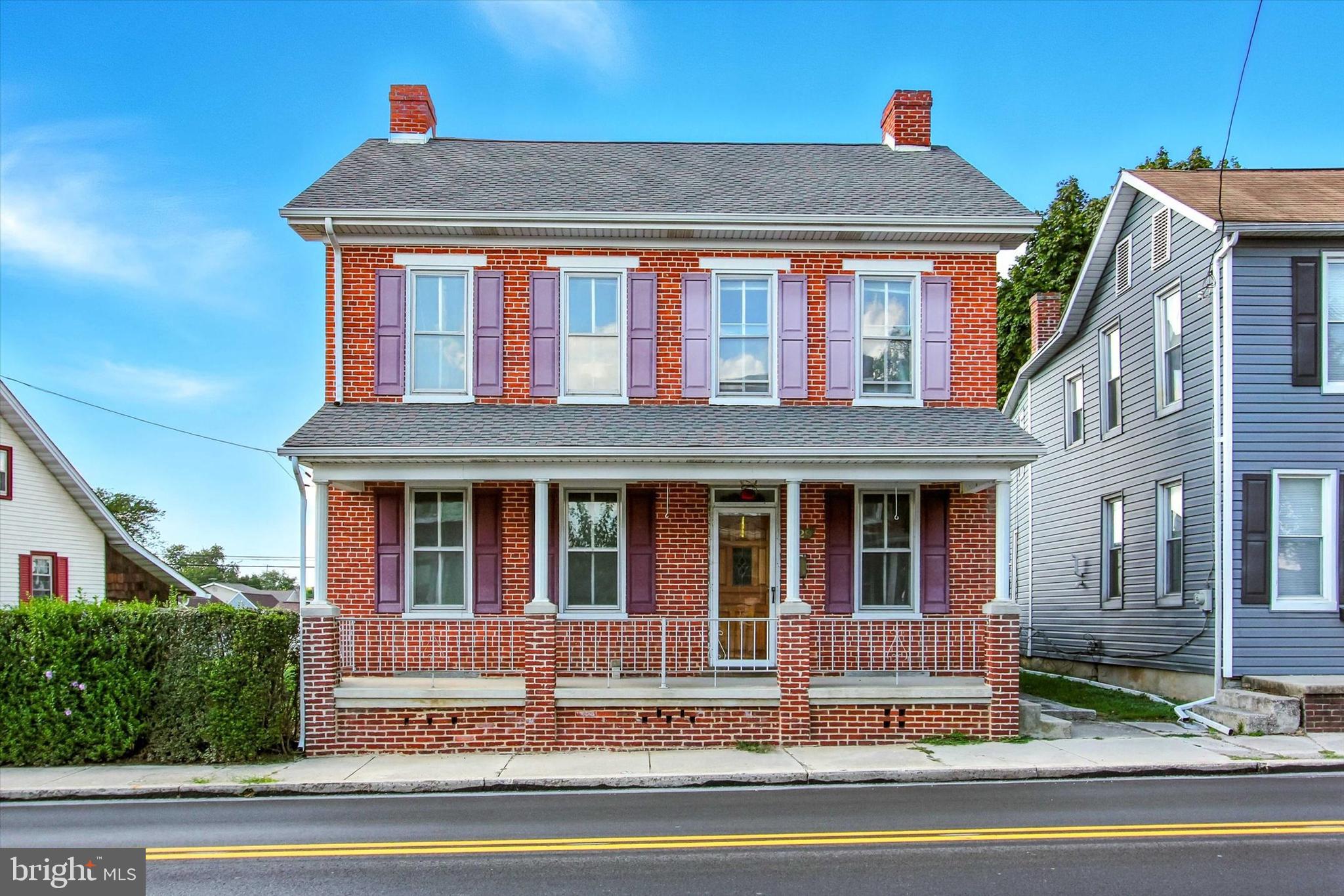 Welcome to 129 Main Street, McSherrystown! Charming 3-bedroom, 2-bath single-family home in the heart of McSherrystown. Features include a spacious living room, family room with fireplace, first-floor bathroom and laundry, and brand-new carpeting in all bedrooms. Both bathrooms have new flooring, and the entire home has been freshly painted. Enjoy the outdoors with a front porch, back patio, and a private backyard oasis featuring a saltwater pool with newer liner and pump. The side yard is perfect for a garden or outdoor space. Plenty of parking with a 3-car garage. Conveniently located near shopping, dining, hospital, and just a short drive to historic Gettysburg and Codorus State Park. Includes a 1-year home warranty for added peace of mind. A perfect blend of comfort, location, and value—a joy to show!