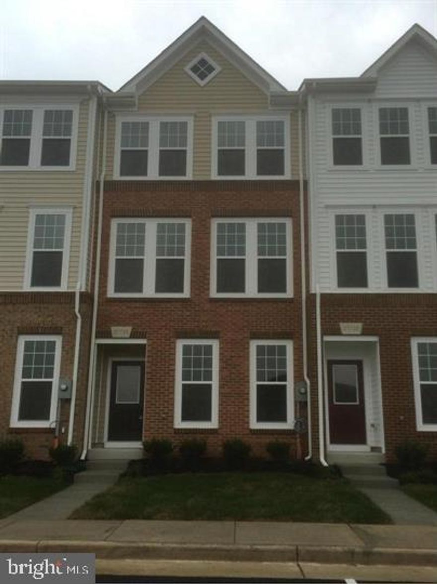 Bright Entrance into Entertainment Rm w/Full Bath  Owner Pays HOA, Lawn maintenance free.
This beautiful end unit townhouse features 3 bedrooms 3 full baths and 1 half baths. Main level features impeccable finishes through from a beautiful hardwood floors to a lovely kitchen. The kitchen has all the granite counter space you could ever want, new tiles and SS appliances. Spacious master bedroom featuring a luxurious walk-in closet and a beautiful master bath located on the third floor together with two additional bright bedrooms and one more full bath. Lower Level features recreation room with half bath, and additional storage closet. Highly desirable location close to the metro bus stop, fantastic schools, shopping center and route 28! Welcome Home!