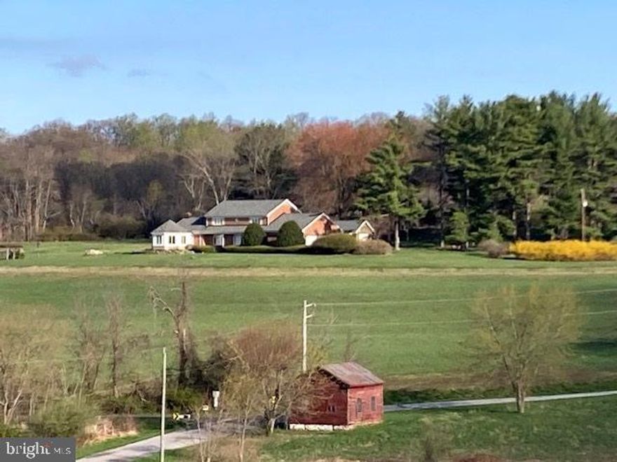 This is a lovely older colonial that is in very good condition.  The home offers a traditional floor plan design concept with large rooms throughout. The kitchen and dining room combined area is large and includes plenty of floor and wall cabinetry for necessities and special dinnerware or collectibles.  The oversized family room offers a beamed ceiling and massive floor to ceiling wood burning fireplace that's adjacent to the large (almost new) octagonal sunroom that offers miles-long scenic views.  The foyer area adjoins a step down to a large living room area and front door that exits to a large front porch with the same incredible views, and evening shade.  The upper level offers 4-nice sized bedrooms and 2-full baths (1 that's been recently upgraded).  The yard offers an abundance of space for large cookout activities, large garden area, evening horses or 4-h animals if that's your cup of tea.  The tennis court needs some TLC but is functional. Bonus grape arbor for your grape picking pleasure :) Upgrades within the past 2-years include: Sunroom, roof, 2-full baths (new remodel), some new exterior lighting, etc. Shown by appointment only, please do not drive down the driveway without your agent representative.