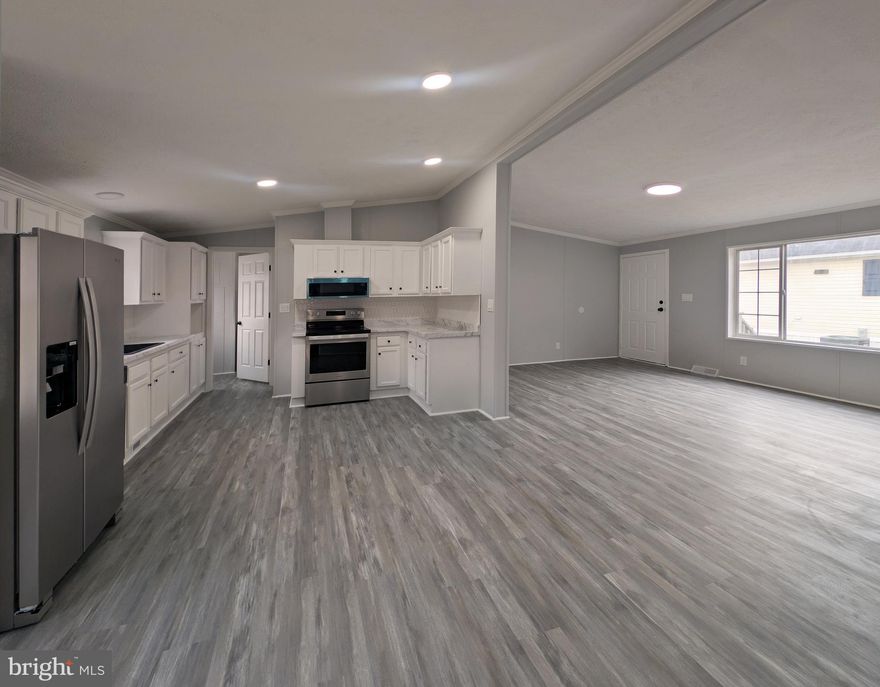 Modern Elegance Meets Spacious Country Living!

Welcome to a home that defies the standard mobile home expectations. This stunning, wide-open doublewide has been meticulously updated with premium finishes throughout, offering the perfect blend of contemporary style and comfortable functionality.
Gourmet-Inspired Kitchen: Featuring high-end cabinetry, sleek countertops, and modern appliances that make meal prep a delight.

Luxury Flooring & Trim: Thoughtful upgrades throughout the home provide a cohesive, high-end feel.

Spacious Layout: The generous floor plan offers plenty of natural light and room to breathe, perfect for both relaxing and entertaining.

****961/month lot rent