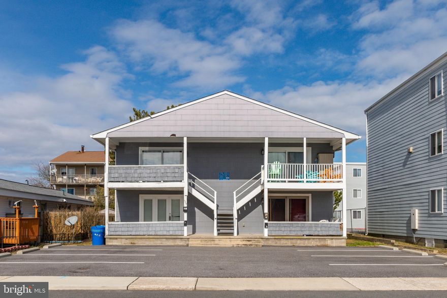 This is it! Great price for this lovely 2BR 2BA bayside condo in a small 4 unit building. Bright open floor plan with side windows that brighten up the entire area. Large family kitchen with updated cabinets, double sink, tile back splash, recessed lighting and counter seating. The entire unit has just been painted and and features include ceramic tile, track lighting, chair rail, crown molding, ceiling fans, master bedroom with bath, updated baths, vinyl windows, full size washer and dryer, paved parking lot with 2  spaces, and a nice front porch! Convenient location close to everything! Low condo fees! This unit is now active and ready to show! Contact us today!