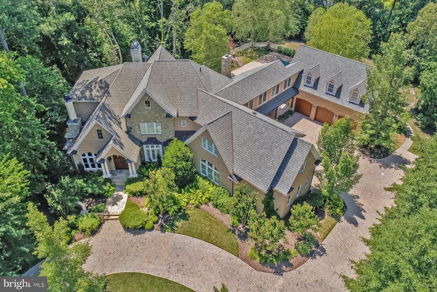 PRICED TO SELL - Exquisite 10,000 square foot home built with remarkable craftsmanship and luxury upgrades throughout. Rich with amenities and custom architecture details for year-round luxury and relaxation.  Six bedroom suites,  four and half baths, an executive office, five car garage bays, separate guest apartment, five fireplaces, hardwood flooring on 1st and 2nd level.  Open concept great room with well-appointed kitchen offering a large island, Sub-Zero refrigerator, Viking/Miele appliances, adjoining butler's pantry with sink,  a 2nd refrigerator and dishwasher.  The grand master suite is on the main level.  Enjoy the outside from floor to ceiling windows, or step outside to resort amenities,  20'x 40'  heated pool,  outdoor kitchen & cabana and koi pond.  The lower level has its own entertainment haven, wet bar,  lounge and billiard rooms,  fitness studio,  movie theatre,  half bath,  and lots of storage. From this level,  walk out the double sliding doors to the custom design hot tub/spa and firepit.  This 1.07 acre premium lot is the most private in the community.  Home is energy efficient with a 7-zoned heating and cooling geo-thermal HVAC system .  Additional features include a whole house generator,  4 tankless hot water heaters,  smart lighting system, central vacuum and invisible fence.  The entire house is on natural gas.  Walk or bike within minutes to downtown Lewes, State park and beaches.  Don't miss this opportunity to own this one of a kind home.   See virtual tour.