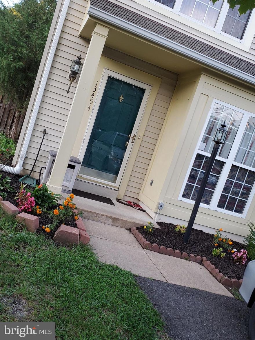 New Listing will not last long on the market. Sought after location. 3 bedrooms, 2 bath, 3 level townhouse. Freshly painted interior. Kitchen updated in 2020, Stainless steel refrigerator and range.  Hardwood floor in living room and dining . Attention commuters GREAT LOCATION and easy access to public transportation. Do not let this one get away.Two Living room main level entry with nice living room with open kitchen.2nd level 2nd living room with one bed and full bath with deck entry.Third floor master bedroom high ceiling, and 3rd bed room huge bath with both room ceiling fan reseed light. End unit with extra space on side with nice concerted patio rear entry door to main level and 2nd on 2nd  level to deck Nice townhouse on dead end circe backyard attached to kids play area@@@