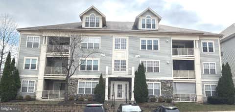 Photo of 8901 Stone Creek Place #104, BALTIMORE, MD 21208 (MLS # MDBC2173248)