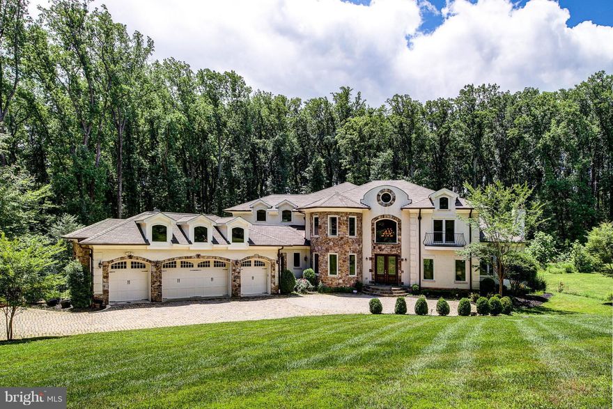 Only 5 years old!One-of-a-kind Mediterranean smart home,10-20 ft high ceilings,abundant natural light w/60 windows&100% raw silk curtains from Dubai,elevator,automatic mega generator for 12,000 sq ft int.,walkout basmt,4 car garage,4 acres private property w/natural forest,great curb appeal,7 min to Tysons,15 mins to Dulles Airport.Possible $1M Bonus SubDivision. Swimming pool drawings available.