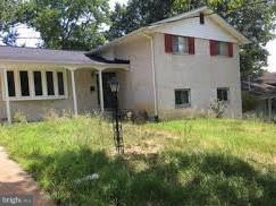 *ATTENTION INVESTORS* Split Level, 4 bed, 3 full bath, hardwood floors, fenced in backyard. 203K or cash. Property being sold "AS-IS. Structural problems and foundation problems.