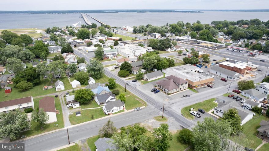 Positioned for prime exposure, this exceptional real estate opportunity lies just off US Route 50, conveniently near Downtown and the upcoming Waterfront redevelopment project in Cambridge. The property encompasses two parcels, totaling around 0.3 acres. One corner parcel previously hosted a building that was removed in 2023, and utility connections are already established. Prospective buyers should confirm all potential uses with city planning and zoning authorities.