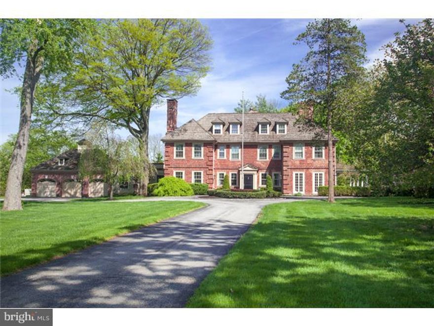 Stately, Brick Georgian Colonial nestled on 1.7 acres in Northside Villanova.  A unique combination of old work details combined with modern appointments make this home a must see. This 6 bedroom, 4.2 bath, sun-filled home offers grand entertaining spaces, along with a great deal of warmth.  The formal entrance hall features beautiful millwork and a large, grand gas fireplace.  To the left, enter the formal dining room with fireplace and millwork.  To the right of foyer are two sophisticated, intimate Living Rooms, complete with moldings, original window hardware and fireplace.  Exit to porch, large enough to accommodate several sitting areas, with chandelier and mahogany floor.  The newer chef's kitchen has Calcutta Gold marble counters, walnut island, two dishwashers, Wolf range, Subzero refrigerator and large breakfast room.  Laundry Room is adjacent to Breakfast Room, providing organizational and storage space.  Kitchen leads into a sunny Family Room with french doors to flagstone patio and attached three-car garage.  The first floor also features both formal and informal Powder Rooms with Waterworks fixtures.  The staircase leads to the Master Suite with wood burning fireplace and large, marble master bath with double sinks and two walk-in closets.  Second bedroom features fireplace, hardwood floors and is served by hall bath.  Third bedroom, with ensuite bath, also features wood floors.  Fourth bedroom completes the second floor.  Third floor offers two additional bedrooms, hall bath with clawfoot tub and additional storage space.  This home has 3 zone heat, 2 zone A/C, security system, and back-up generator.  The private, flat, sunny grounds boast specimen plantings and automatic sprinkler system.  This special home must be seen to be truly appreciated.  Owner is a licensed realtor.