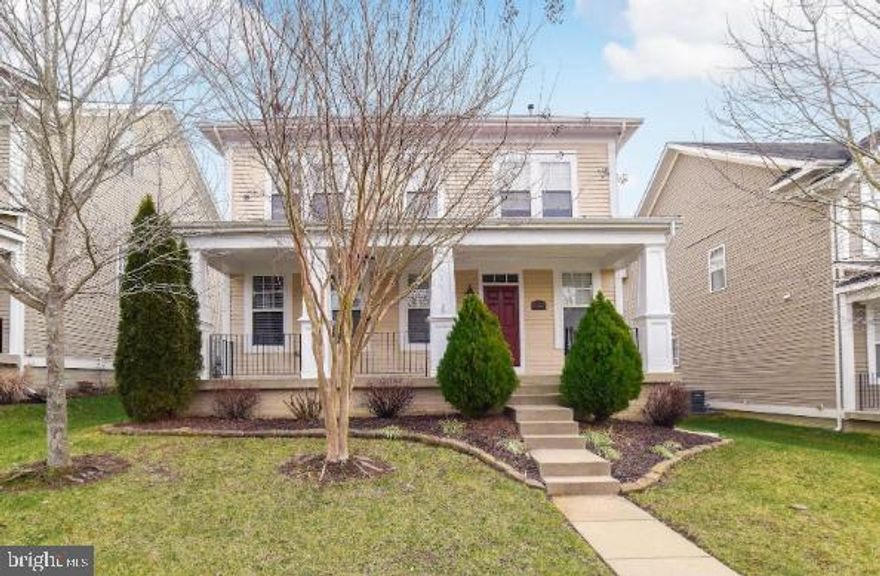 Chock-full of upgrades, shows beautifully, with hardwood throughout main level! Over 3600 sf: living, dining, and kitchen space are open-concept for easy living! Gorgeous upgraded kitchen w/cherry cabinets, 5-burner gas range, granite, stainless, breakfast nook & pantry. Tray ceiling in MBR creates spacious feel; 2 walk-in closets & super bath w/upgraded tile & jetted tub, sep shower. 3 more BRs, 2 w/WICs, 2 more full baths upstairs. Lower level has big rec room/game rm, plumbed for wet bar, plus 5th BR & 4th bath. Whole-house audio, nat gas heat, ethernet & surround sound pre-wire. Hydraulic back-up to sump pump for extra protection from power outages. Welcoming front porch, back deck for grill, nicely landscaped. Community has pools, tennis, walk/jog path, tot lots! HOA includes clubhouse, pool membership, trash removal, community amenities--you'll love it here!