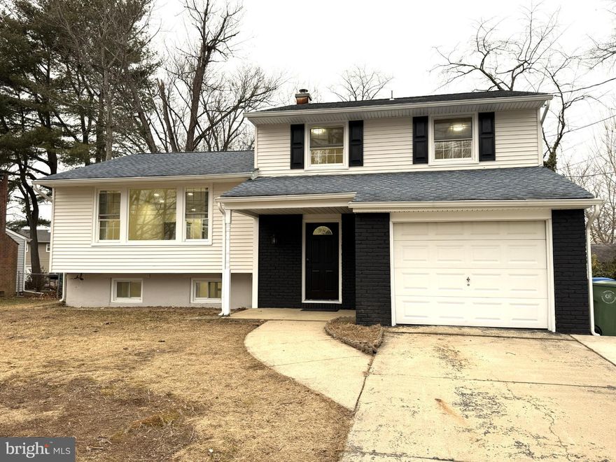 This charming, renovated split-level home, offers a perfect blend of classic design and modern comfort. Great School system. Residence offers a warm and inviting atmosphere. Step inside to discover a beautifully maintained interior featuring luxury vinyl plank flooring that flows seamlessly throughout the home. The heart of the home is the well-appointed brand new kitchen, comes with solid wood modern cabinetry and exotic Quartz countertops, equipped with stainless steel appliances, including a gas oven/range, French refrigerator and a convenient microwave. Family room with the cozy electric fireplace adds a touch of warmth and ambiance, making it an ideal spot for relaxation during cooler evenings.  This home boasts three comfortable bedrooms, providing ample space for rest and rejuvenation. The two full bathrooms and an additional half bath ensure convenience for everyone. The fully finished basement, with interior access and heating, offers endless possibilities-transform it into a home office, playroom, or entertainment space to suit your lifestyle. Natural light pours in through double-hung, double-pane windows, enhancing the inviting ambiance throughout the home. The attached garage provides secure parking and additional storage, while the driveway accommodates two more vehicles, ensuring that you and your guests always have a place to park. Outside, the property is surrounded by a peaceful environment, perfect for enjoying quiet moments or outdoor activities. The spacious layout and proximity to local parks and recreational areas offer plenty of opportunities for outdoor enjoyment or short travel to shopping and entertainment in the area. This home is not just a place to live; it's a sanctuary where memories are made. With its excellent condition and recent renovations, it presents a unique opportunity to invest in a property that combines comfort, style, and modern conveniences. Don't miss your chance to make this delightful residence your own!