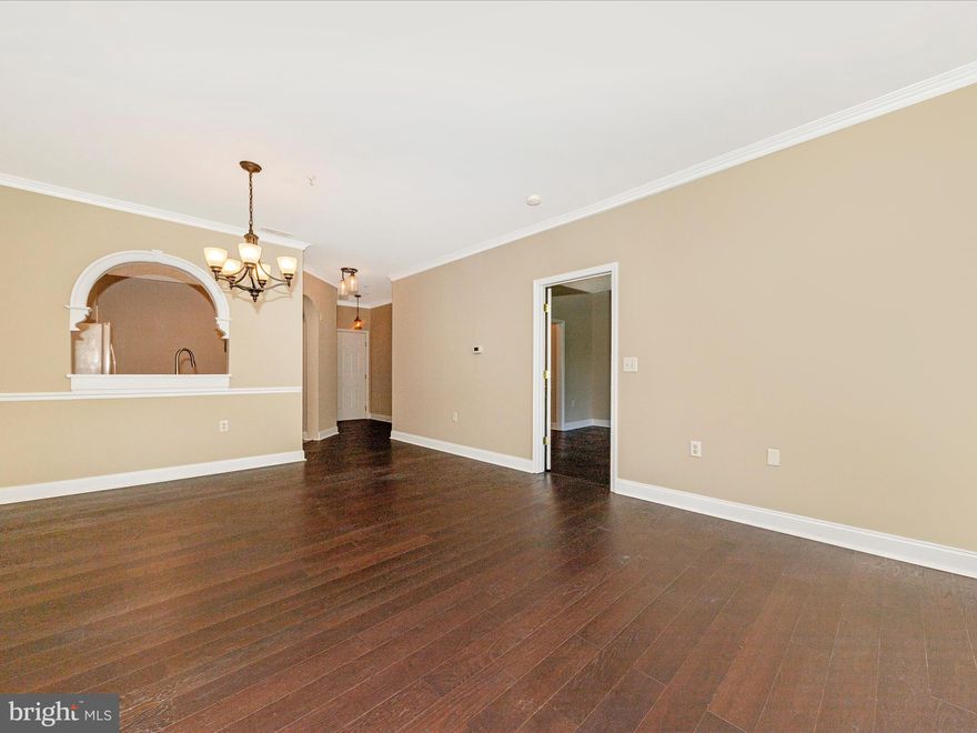 This Penthouse model condo features 2 large bedrooms and 2 full baths in a secure building with elevators! Fresh paint, LVP flooring, beautiful fireplace and a private balcony that overlooks a serene wooded area all await you.  Sit outside and watch the deer or relax by the cozy fireplace with your favorite hot beverage. Private garage parking space AND one in front of building.  You will get to enjoy all of  Wormans Mill community activities, like the pool, community building, basketball and tennis courts, playground and walking trails.  This condo is convenient to shopping, dining and all that Frederick has to offer.  Make your appointment to see it today!