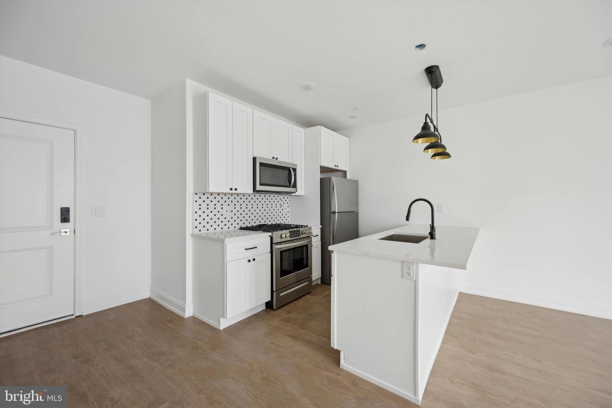 The Casa at 1614 Ridge Ave features 32 brand-new apartments. Each unit offers high-end finishes like stainless steel appliances, stone countertops, and designer light fixtures. Amenities include a gym with a sauna, a stylish lobby, and gated off-street parking. Located near Ridge and Fairmount Avenue corridors, 1614 Ridge offers easy access to award-winning restaurants, key highways, and transit options for quick commutes into Center City. Unit 205 showcases an airy design with a generous kitchen peninsula, a personal outdoor space, a roomy bedroom, and built-in closet organizers. Enjoy stunning views, modern lighting, and plenty of natural sunlight.
Promotions: Price is effective rent after a one-time $5680 concession taken on the tenant ledger upfront on a $2840 lease price.