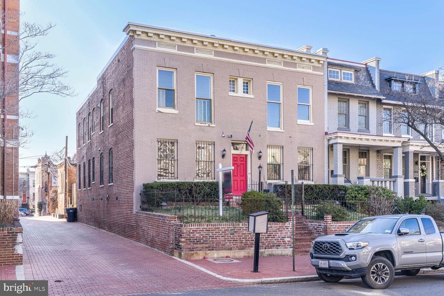 Gorgeous 2 bedroom, 1 bath condo in charming Capitol Hill! This move-in ready home features hardwood floors, exposed brick, high ceilings and a wood burning fireplace. Welcome home to an open living/ dining room followed by a sunny kitchen with stainless appliances and granite counters. Down the hall, find a primary bedroom followed by a hall bath and second bedroom stepping to a rear deck that’s perfect for entertaining. (New decking coming in late spring) Perfectly located three blocks from Lincoln Park and just steps from Eastern Market and the H Street corridor with countless bars, restaurants and shops, and less than a mile to Eastern Market Metro and Union Station.