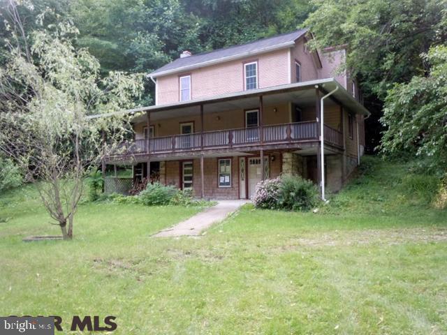 Over 4 acres with a private, rural location outside of Lewistown. This 2-story offers 3 bedrooms, and 1 bath. The main floor has an interior reminiscent of a log cabin. Come take a look. Great as a home or as a get-away retreat.