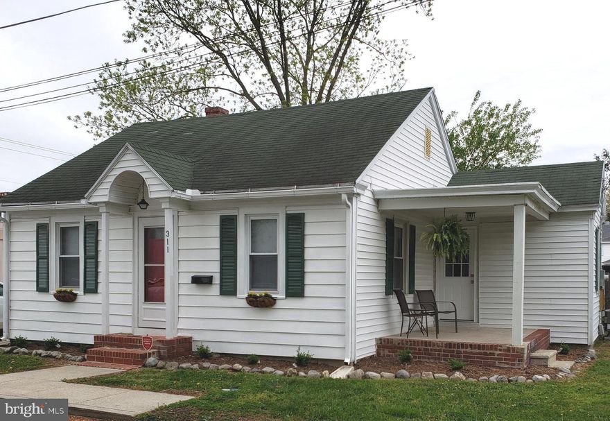 ADORABLE and CARED FOR home!! New paint and carpet with beautiful water proof flooring. Updated kitchen with new oven, faucet and two year old refrigerator. New ceiling fan in front bedroom. New light fixtures in hall, dining room and porch, New bathroom vanity. Water heater is only about two years old. Dining room has beautiful built-ins with access to a lovely attached, covered porch! Freshly power washed with landscaping done. Private backyard with fence. LED CERTIFIED for buyers who wish to use as a rental. This is a MUST SEE that's move in ready.