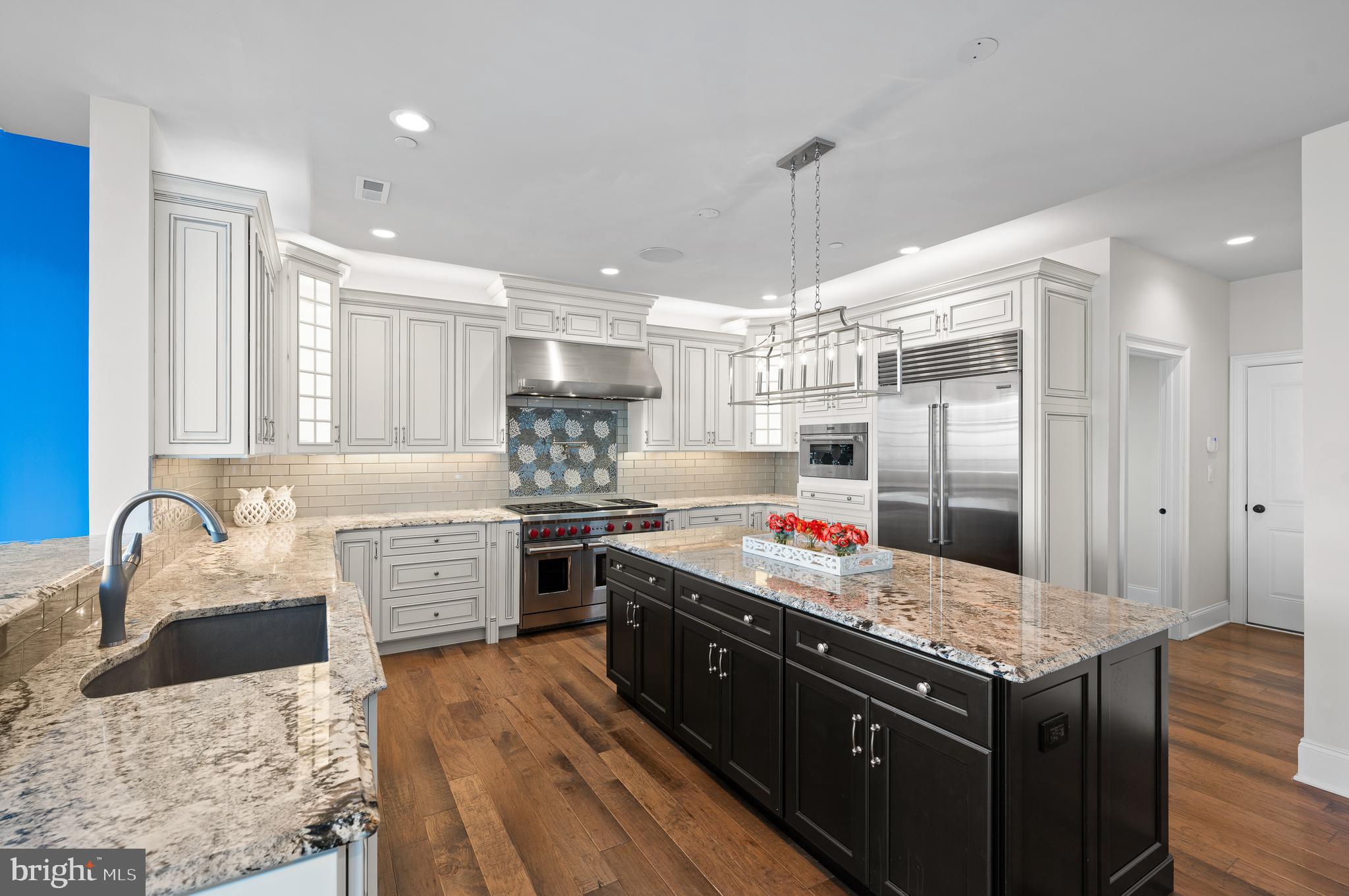 Buyers financing fell through at the last minute. Don't miss this gorgeous home in the prestigious Liseter community in Newtown Square! This exquisite single expanded “Duke” model boasts 4 spacious bedrooms, 3.5 luxurious bathrooms, and over $360,000 in upgrades.
As you approach the house, you will notice a fully paved driveway and elegant curved walkway to the front door. You'll be greeted by an airy 2-story foyer and a sweeping curved staircase with upgraded wrought iron spindles. To the left is the grand living room featuring a stunning tray ceiling and a charming bay window that bathes the space in natural light. The adjacent dining room, also outfitted with a tray ceiling, is perfect for hosting intimate dinners or holiday celebrations. The open floor plan is accented by the 2-story, expanded family room with floor-to-ceiling stone gas fireplace, built-in custom wall unit and coffered ceiling with extra large ceiling fan. The built-in wet bar with mirrored backsplash is so convenient when entertaining! Open to the family room is the gourmet kitchen, equipped with top-of-the-line WOLF range with 2 ovens, six burners and a griddle, a custom tiled backsplash and a pot filler, WOLF microwave and a Subzero refrigerator, level 5 custom cabinetry, walk-in pantry, upgraded countertops and a large center island, making it a chef's delight.
One of the highlights of this home is the bonus “Naples Sunroom” off the kitchen. This light and bright room can be used as a breakfast room or a serene retreat where you can enjoy your morning coffee or unwind with a good book. Off this bonus room is a huge maintenance-free deck with built-in outdoor kitchen, complete with grill and stainless beverage cooler. The office is a perfect work from home option with additional phone/data Cat6 cable. The mudroom, half bath, and an expanded 2 car garage complete this floor. Upstairs, the expanded primary suite is a true sanctuary, featuring a spacious bedroom, sitting room, 2 walk-in closets with a closet system, and a spa-like en-suite bathroom with dual vanities, make-up vanity, a Whirlpool tub, and a separate shower. There is a princess suite with an attached bathroom with a tub/shower combo and 2 spacious bedrooms with upgraded carpeting that share a hall bathroom. You will enjoy the convenient second floor laundry. The lower level features a daylight walk up basement, 10’ ceilings, and a rough-in for a future bathroom. Some of the many special features include: built-in speakers in the ceiling, hardwood flooring throughout the first floor and second floor landing and primary suite, and the upgraded “Charleston” trim package. There is also a hook up outside for a generator. The Liseter community offers a wealth of amenities, including walking trails, a clubhouse, gym, and a swimming pool, and community social events, ensuring a vibrant and active lifestyle. Conveniently located near shopping at Ellis Preserve with Whole Foods, dining, and next to top-rated Episcopal Academy and Marple Newtown Schools. Don’t miss the opportunity to make this stunning Duke model your forever home. The unparalleled Liseter lifestyle awaits you!