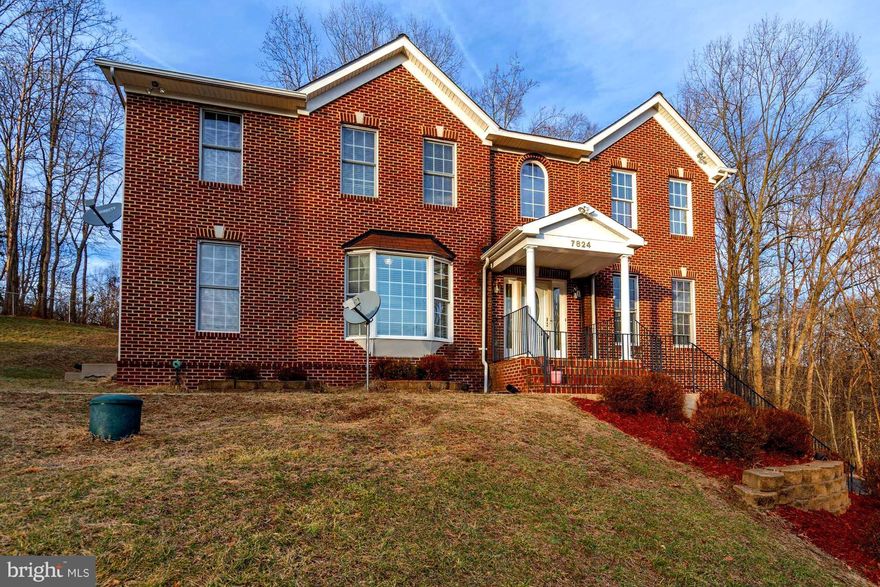 One of a kind!!! 5Bed 3.5 Bath w/private backyard & almost 3400 finished Square feet. Kitchen w/White Cabinets, Granite counter, and SS Appliances. Hardwood floors on the main level with walkout to Screened in porch & huge deck. Custom paint on all 3 levels w/Mother in law Suite in the basement w/Jacuzzi Jets & Sep Shower. Wood bar in the basement for entertainment. 45K below Zillow Est True Deal.