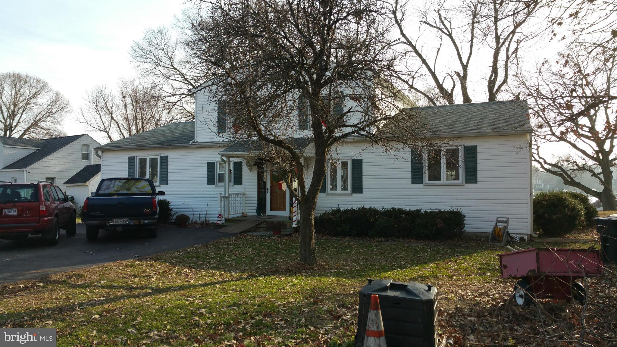 Over 1/2 Acre lot - 70 Ft on the Bodkin - Pier with lift - Remodeled in 2000 - Large Country Kitchen w/breakfast bar - walk-in Pantry and nice waterview - Huge MBR suite w/2 walk-in Closets - waterview, and Bath w/walk-in shower - Enclosed waterfront porch - Beautiful waterfront Lot - Always a breeze, good crabbing - quick boat ride to waterfront restaurant and also to the Bay.