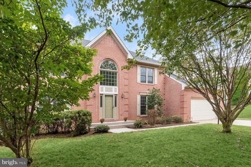 Welcome to this spacious brick-front colonial in sought-after Ellicott City, where classic elegance meets modern comfort. The sun-filled floor plan is designed for luxurious living, featuring a dual-zone HVAC system (2021) and a water heater (2014) to ensure year-round comfort. Step into the impressive 2-story foyer that flows seamlessly into the formal living and dining rooms, each adorned with elegant accent molding that adds a touch of sophistication.  The gourmet kitchen is perfect for both casual meals and entertaining, offering a cooktop island and a bright breakfast room. Adjacent, the spacious family room boasts a charming brick fireplace and soaring atrium windows, filling the space with abundant natural light and creating a warm, inviting atmosphere.  There’s an office and laundry room conveniently located on the main level.   Retreat to the expansive primary suite, complete with an impressive tray ceiling, two walk-in closets, and a luxurious en suite bath that features a soaking tub, separate shower, and dual vanity—an ideal space for unwinding at the end of the day.  Four additional bedrooms and a full bathroom complete this level.   The unfinished basement with walk-up access to the backyard provides endless potential for customization, allowing you to create the perfect space tailored to your exact needs.   This home offers timeless appeal, modern amenities, and an ideal location, ready to welcome you home! Seller prefers an as-is sale.