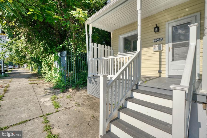 Newly renovated with all new features typically found in much more expensive homes. The main level features an open, flexible floor plan with hardwood floors and tall ceilings.  The kitchen is spacious, with wood counters top, tall white cabinets and better quality stainless steel appliances.   The second floor has two spacious bedrooms with a designer ceramic bath and ample closet space. The oversized fenced back yard is perfect for gardening and entertaining. There is potential for creating parking in the back yard. 
The unfinished basement is your blank canvas with good ceiling height . Use it for storage or transform it into the additional living space that your heart desires. Enjoy quiet evenings on the fenced in back yard. Minutes to John Hopkins University, Loyola, Morgan, and Notre Dame. Convenient to public transportation, train stations, tons of dining and shopping options, and Downtown.
Yo Hable Español!!