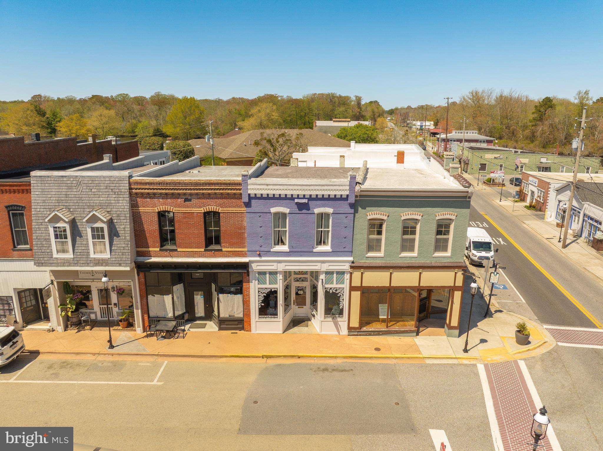 Beautifully renovated building in downtown Snow Hill, MD! Now is your opportunity to own this mixed use building. Both levels have been meticulously renovated. The first floor walks in from busy Green St. and is surrounded by several thriving businesses and only a one block from the courthouse. The interior of this level is an open space great for a retail or cafe style setup. There is a utility room, bathroom and backroom with plumbing and storage as well.
The second level is features a great 2 bedroom apartment. Each bedroom has closet space, there is a large full bath with a custom tiled shower. The living space is open and includes a large kitchen with breakfast bar. The kitchen is fitted with cherry cabinets, granite counter tops, and stainless steel appliances. There is a nice dining area and living space as well.
This property would be great for an investor looking to rent each space, or someone that is ready to start their own business and reside above it. Call today to schedule a private tour of this gorgeous building today.