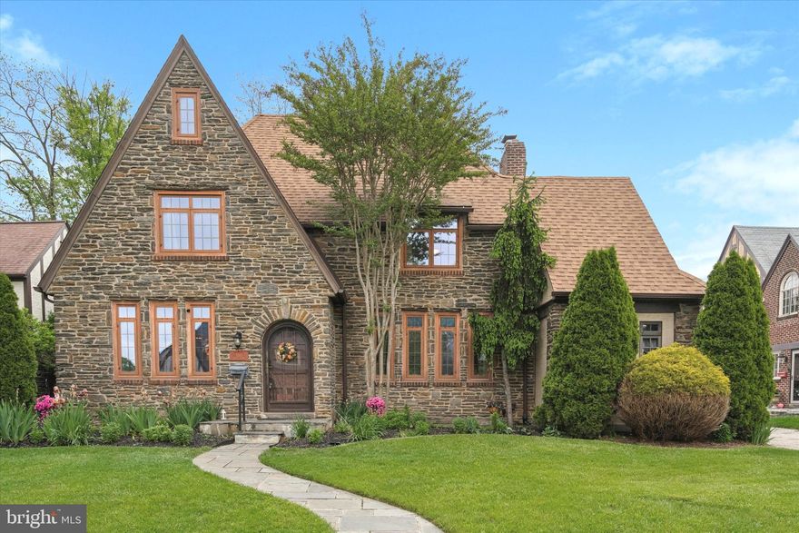 Beautifully maintained Tudor-style home in Drexel Hill.   The arched front doorway provides an inviting entryway leading to the Center Hall of the home.   A formal Living Room with hardwood flooring, stone fireplace  equipped with gas logs - and tall windows for light.  Adjacent to Living Room is a large enclosed Den or Office.   A Formal Dining Room just on the other side of the Center Hall fully equipped with the Tudor Charm!  A Modern New Kitchen with all new appliances (2022) with Breakfast Bar and Eating Area.   The Kitchen boasts Gas Cooking, Microwave, built-n dishwasher, Pot Filler above the  cooktop ... a big bonus!   Very conveniently located in the rear of the home is a large 1st Floor Master with Full Bath installed in 2018!   Entry to a large fenced in yard and patio from the Mud Room.  2nd Floor:  Master Bedroom with  updated Full Bath (2024).  3 additional bedrooms, 1 New  Full Hall Bath (2017), access to full, unfinished spacious attic.  Basement: full, unfinished.   Other amenities include:  First floor central air (2006) zoned.  Second Floor heat pump installed (zoned) installed 2020 - can also be used for heat in milder temperatures.  New Hot Water Heater 2023, New Roof 2010, New front walkway 2013.  The rear yard is  fenced and includes patio.   Shed 16 x  10 at rear of drive, along with parking for two vehicles.   Located in the Aronimink Area of Drexel Hill, this home will please your desires.   Walking distance to newly remodeled Aronimink Elementary School and to public transportation.   The neighboring homes also reflect the Tudor design, fostering a cohesive and charming community!   Perfectly Pleasing!