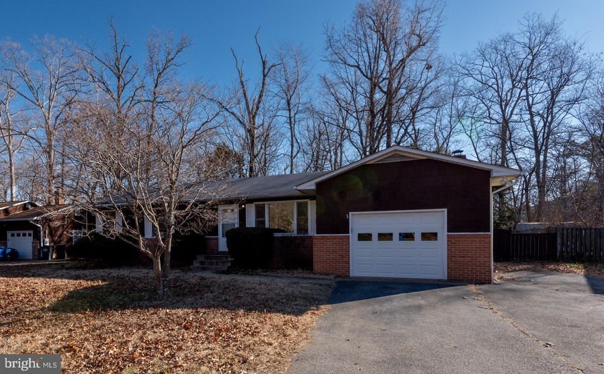 Check out this adorable home located  a minute from gate 3. Well maintained and ready to move in. One car garage and screened in porch with Fenced in backyard. Spacious family room and brick fireplace. Check it out.