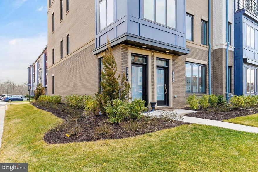 This property was originally one of the model homes for the community, and comes with loads of upgrades.   It is an absolutely stunning, huge corner-unit townhome with panoramic views through large windows.  The light here is amazing.  The layout is perfect, with an open kitchen-dining-living area, expansive waterfall island and ample counter space.  You will love the walk-in pantry and the many sophisticated details such as designer lighting, ship-lap walls, and accent walls.  Soaring ceiling height gives this already spacious home and even more light and airy feel!   Enjoy a luxurious primary suite with dreamy closet and en suite spa-bathroom.  Two other bedrooms and a second bath are on this level along with laundry.  

The upper level boasts a show stopping terrace where you can enjoy sunsets over the mountains while you sip and snack with your friends and loved ones.  This entertaining and relaxing space is the icing on the cake.

We can't overlook the premier location in this upscale community in desirable Ashburn!  Community amenities include a beautiful pool, club house, basketball, tennis, tot-lots, walking trails, and more!  Live the life of luxury here.

SHOWINGS WILL BEGIN SUNDAY MAY 11.