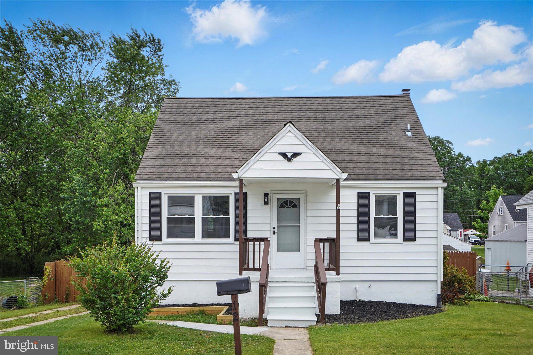 Welcome to 12 N Hawthorne Rd, a beautifully updated 4-bedroom, 2-bath home that combines modern finishes with major system upgrades. Inside, you'll find new flooring throughout and a stylish kitchen featuring quartz countertops. Comfort is a priority with two brand new mini split systems, in addition to a main HVAC unit that is less than five years old. The roof, also under five years old, is equipped with durable architectural shingles. For added peace of mind, the main sewage line and basement waterproofing was completed by the previous owner. This move-in ready home offers both contemporary style and lasting reliability in a desirable location.